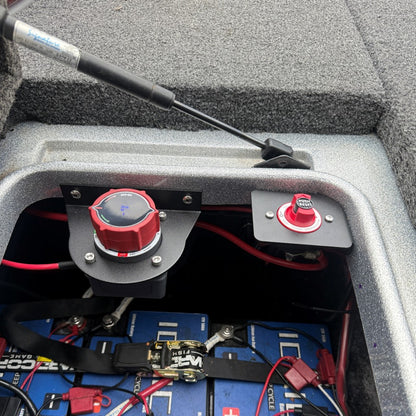 Egis 4701 circuit breaker alongside a universal battery switch mounting bracket on a nitro bass boat