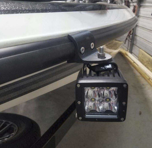 marine vehicle LED light mounted on a bass boat rub rail
