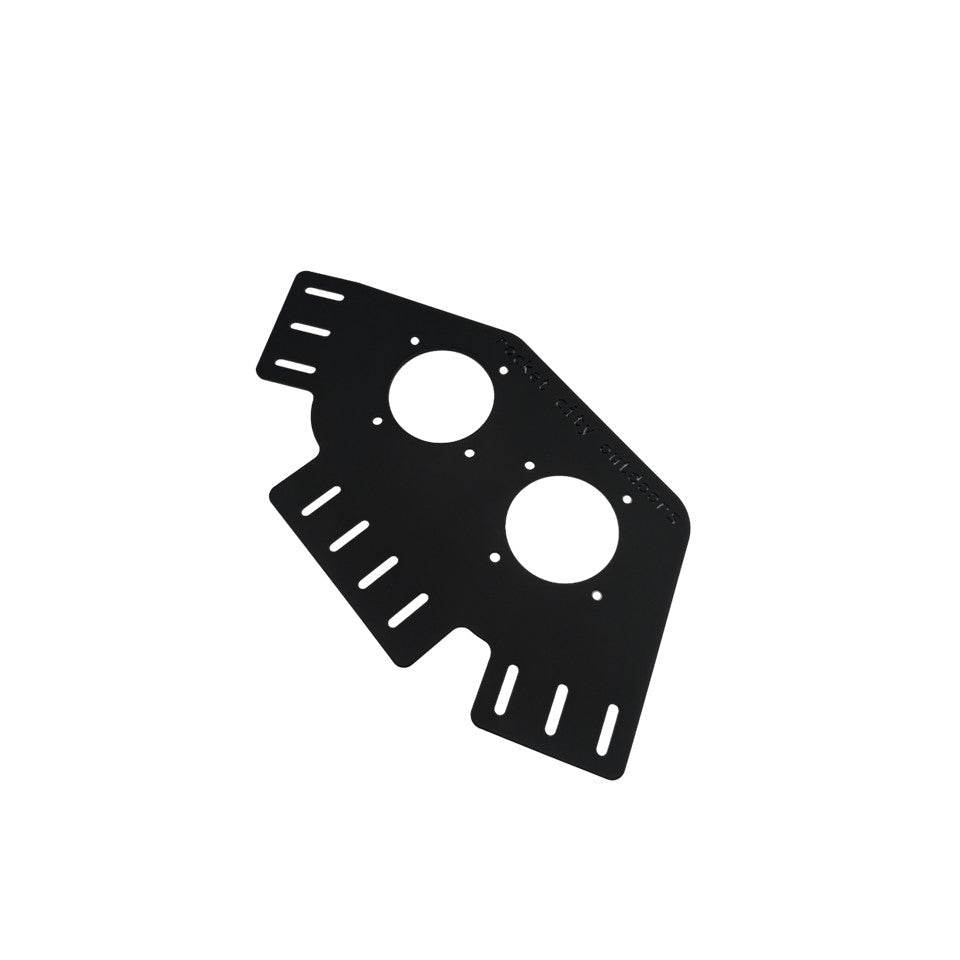 Bass Cat Puma Caracal Double Battery Switch corner bracket in matte black aluminum, with two round switch openings and slotted edges.