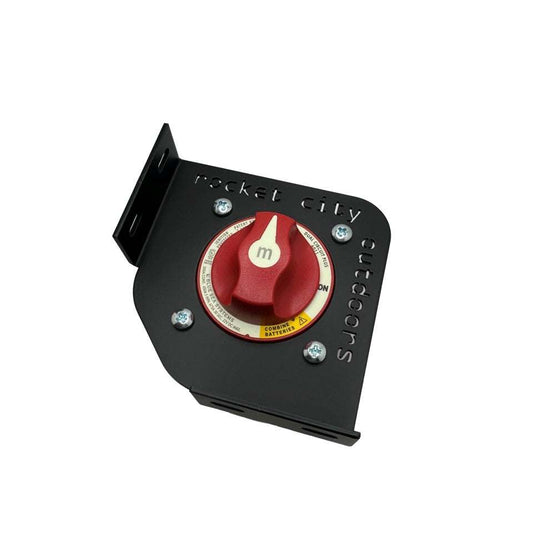 Corner Battery Switch Bracket, black coated metal mount with red rotary battery disconnect switch and raised mounting lip