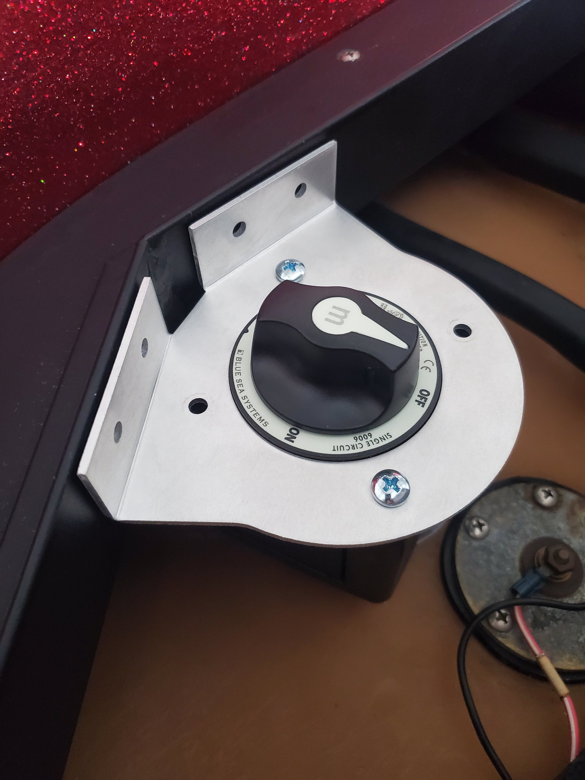 battery disconnect switch bracket made for early 2000's skeeter zx bass boat with a 140 degree corner in the bilge or battery compartment 